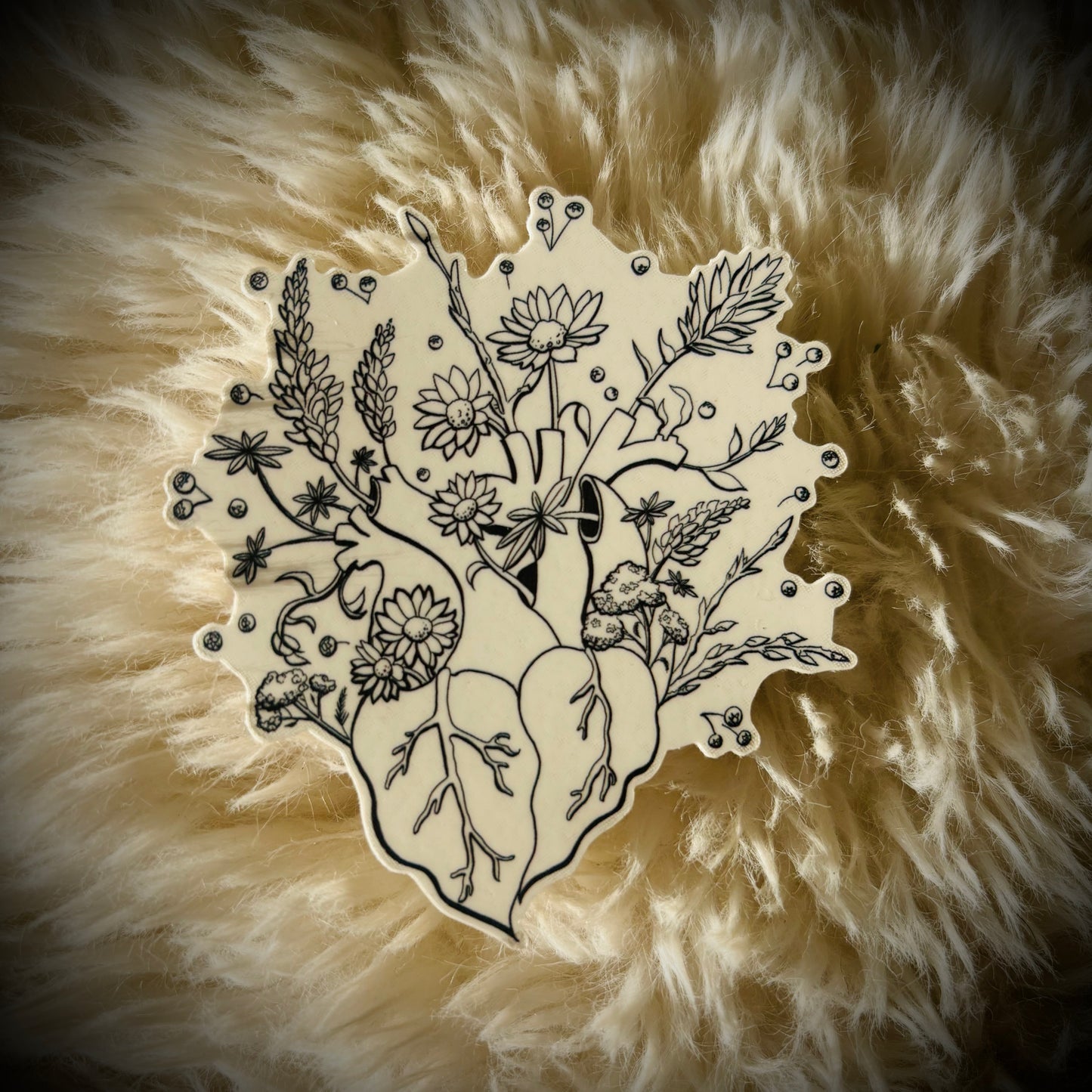 Anatomical heart with plants bursting out the top